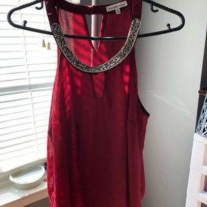 Red sleeveless blouse